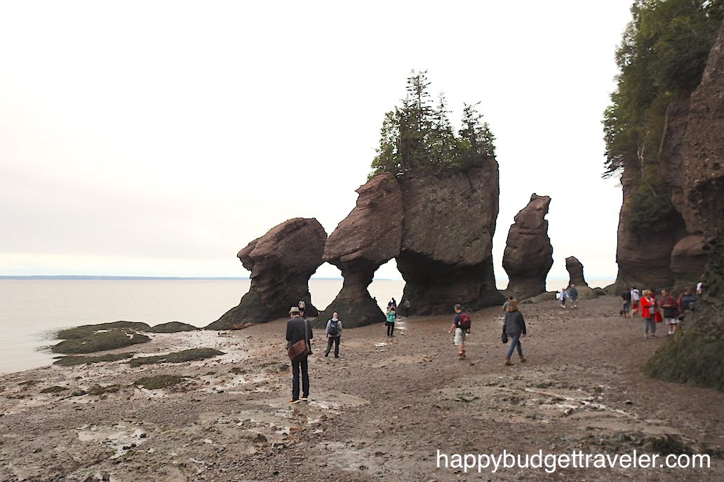 Walking on the ocean floor at Hopewell Rocks In the Bay of Fundy, New Brunswick.