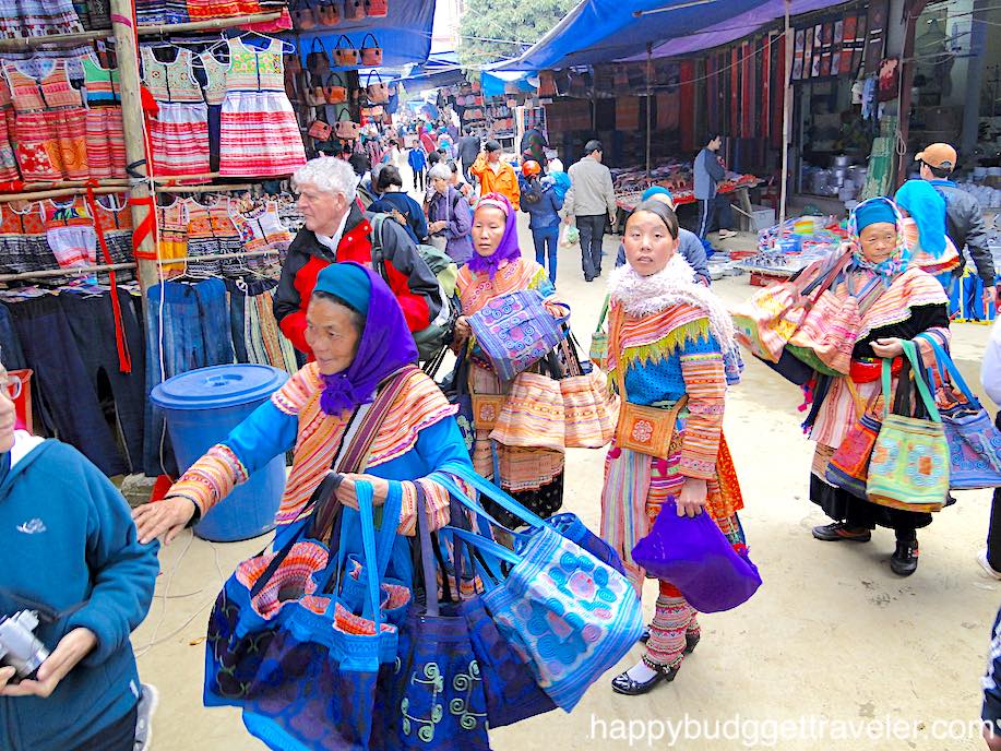 Picture of local tribal women selling goods in Tam Duong market, Vietnam