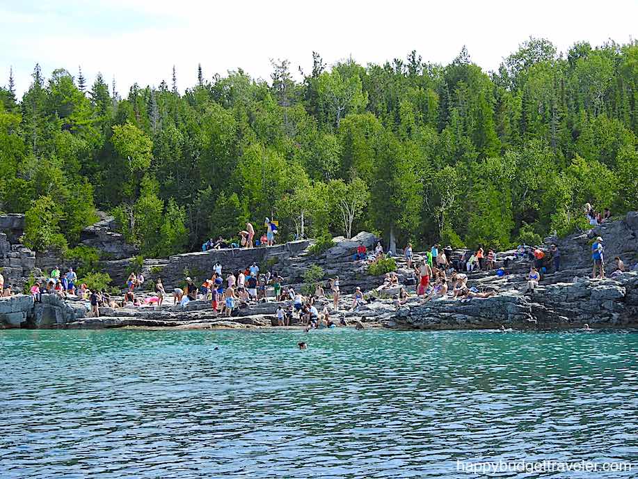 Picture of people swimming at Indian Head Cove in Tobermory as seen from speedboat FLASH 
