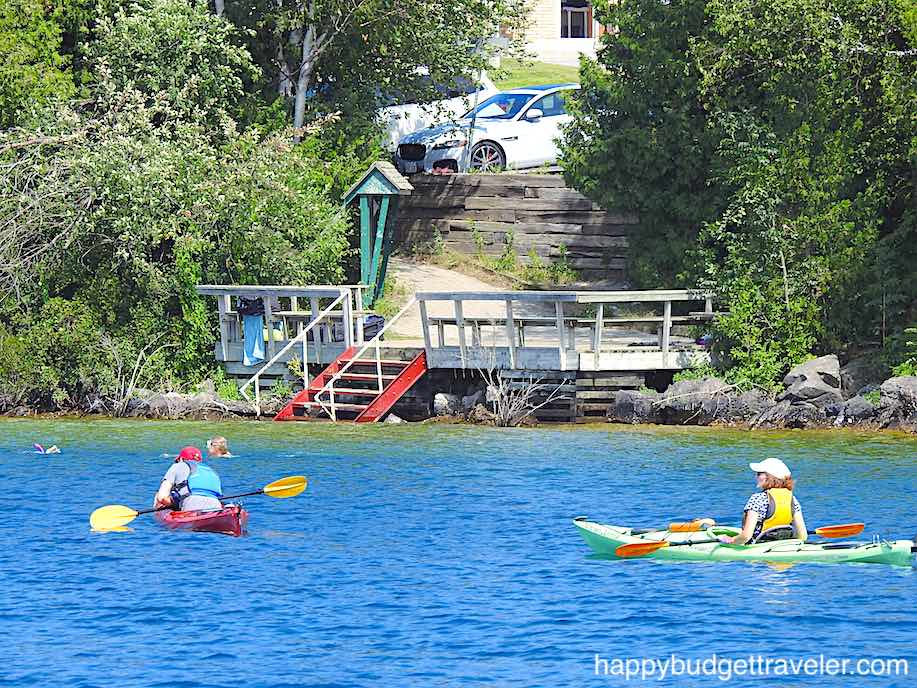 Picture of people Snorkeling and Kayaking over the Tugs shipwrecks, Tobermory