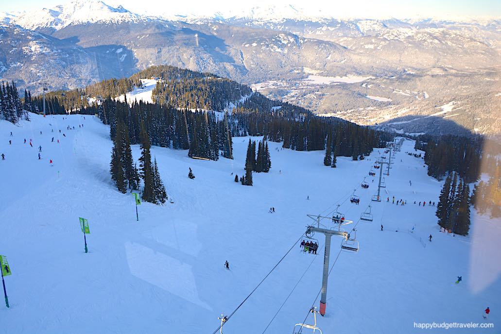 Picture of Skiers riding chair lifts to the top of Whistler Mountain