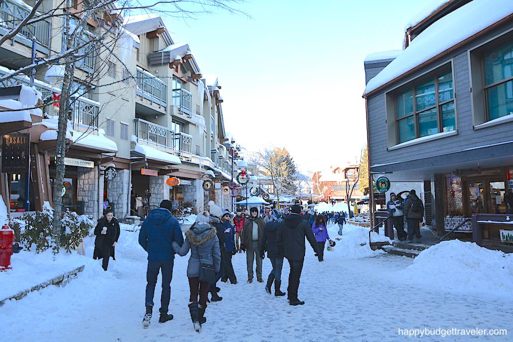 Picture showing people leisurely strolling in a mountain village, Whistler-Canada