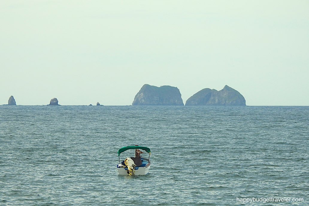 Picture of a person sport-fishing way off-shore in Brasilito