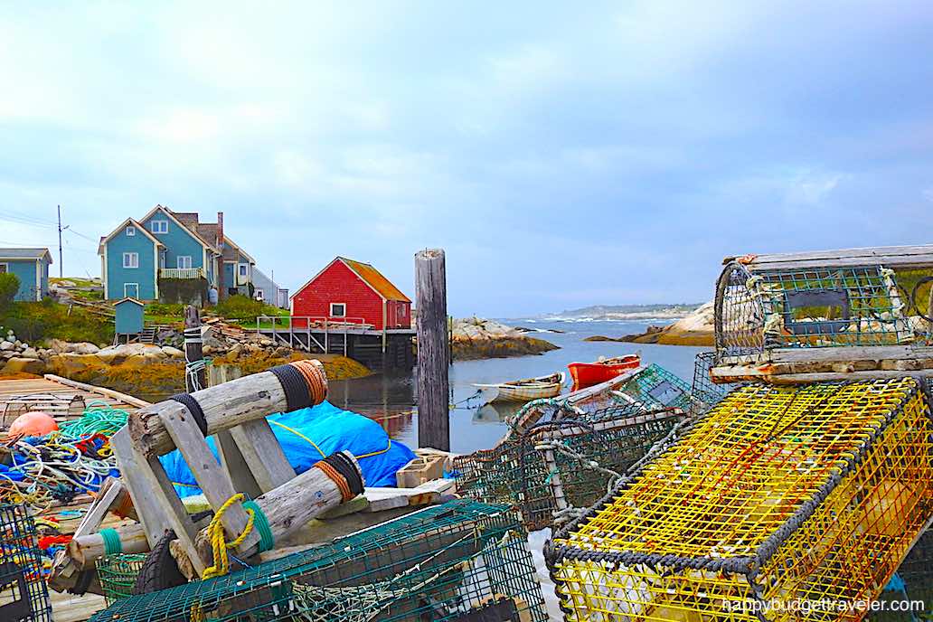 Picture of Lobster traps and fishing nets lining the street, Peggy's Cove-Nova Scotia
