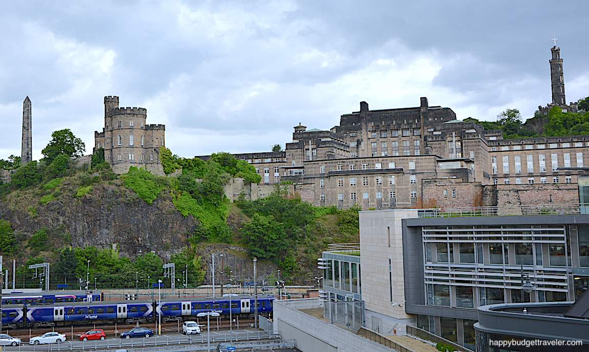 Picture of Calton Hill, Left to right-Thomas Hamilton Obelisk, Old Observatory House, Scottish Parliament, Nelson Monument