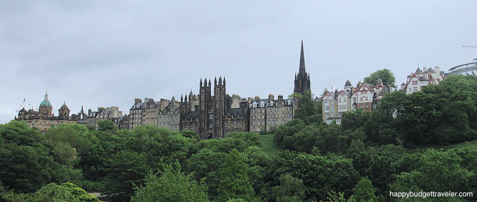Picture of View of the Old Town of Edinburgh over the Princes Garden treetops
