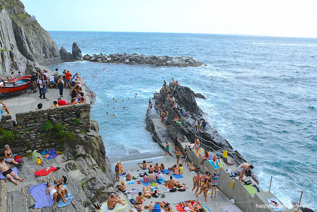 Picture of the boat-slip at the village dock, used by tourists to sunbathe, Manarola-Cinque Terre, Italy