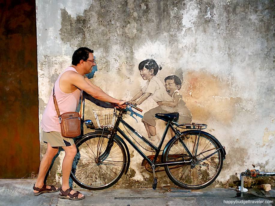 Picture of the iconic children on a bicycle 3D mural on Armenian Street, Penang Island, Malaysia