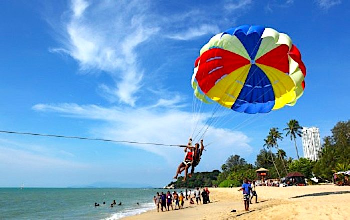 Picture of people Parasailing at Ferringhi Beach, Penang Island, Malaysia - Image credit-seedunia