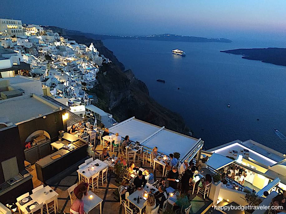 Picture of a view of the caldera and hill-side restaurants at dusk, Thera, Santorini