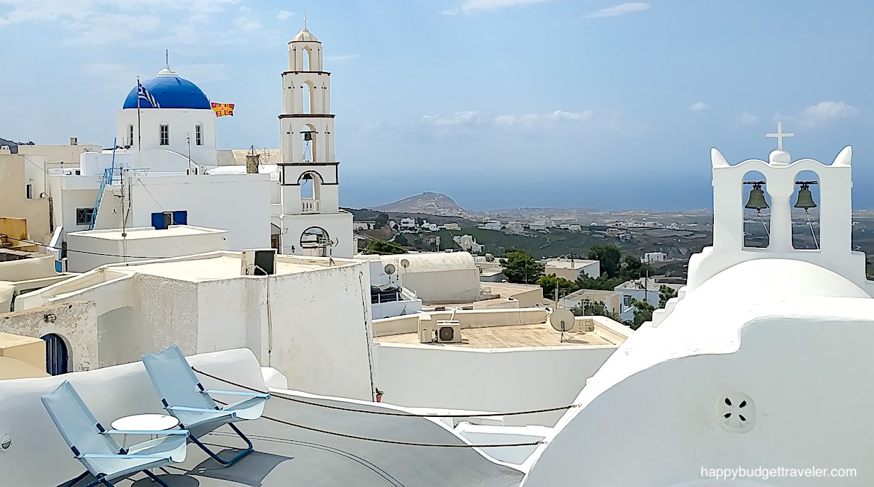 Picture of the view southeast between the bell-towers of the church of the Transformation of God and Saint Averkios, Pyrgos, Santorini